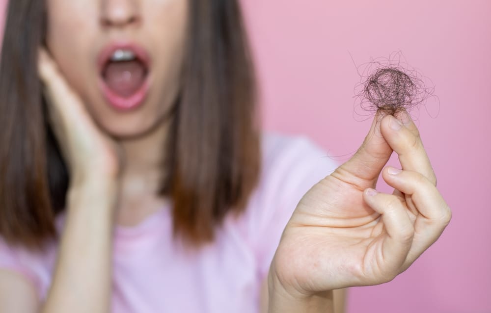 17 Spiritual Meanings When You Dream Pulling Hair Out of Mouth