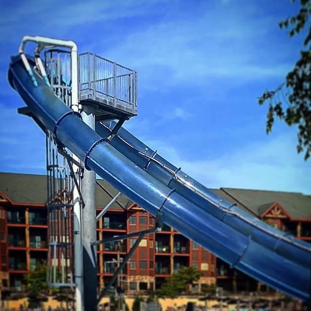 Going down a water slide feet first can indicate that your troublesome times will end without too much issue